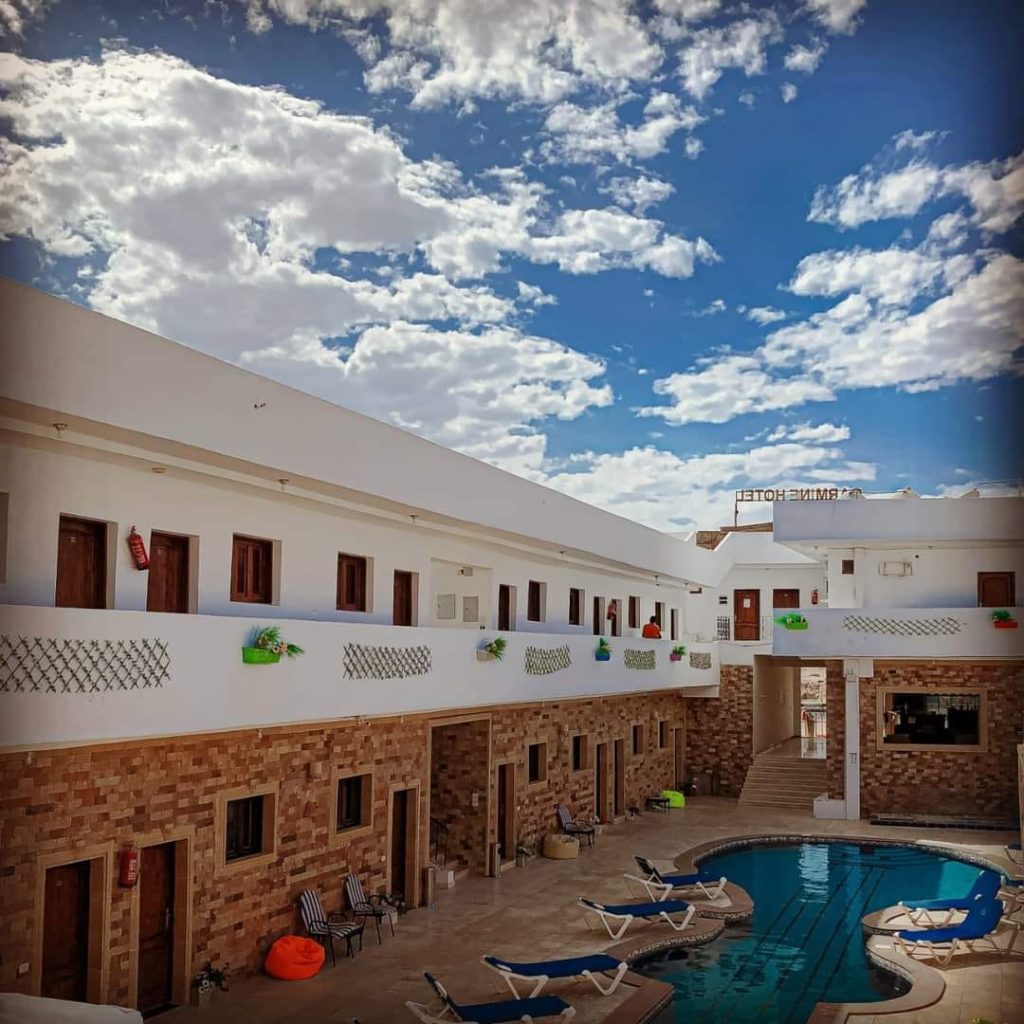 Carmine Dahab offers concierge service, non-smoking rooms, an outdoor swimming pool, free Wi-Fi, a restaurant, airport transfers and a restaurant and Bicycle rental service.